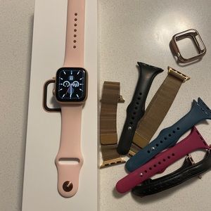 Apple Watch (gold aluminum) series 4 (40 mm) (GPS) and with accessories.